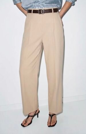 Beige fabric trousers with a brown leather belt